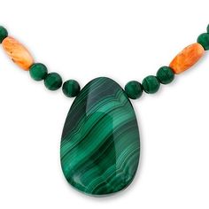 Jay King Malachite and Orange Spiny Oyster Shell Necklace Gorgeous green malachite is the star of this stylish necklace design from Jay King. The piece features a polished, pear-shaped drop of Congolese malachite front and center, with contrasting orange spiny oyster shell bead accents throughout.       Approx. 18-1/4"L x 1-3/4"W with 2-3/4" extender     Stamped .925     Hook closure     Green malachite necklace has large, pear-shaped malachite station in center     Oblong, orange/ white spiny o Malachite Pendant Necklace With Natural Stones, Green Natural Stone Teardrop Pendant Necklace, Green Oval Malachite Necklaces, Green Oval Malachite Necklace, Malachite Necklace, Green Malachite, Stylish Necklace, Necklace Design, Color Bands