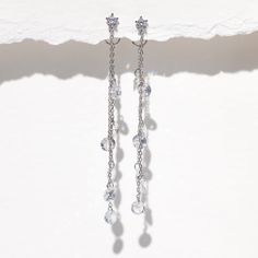 Dew you love these as much as we dew? With cascading droplets of CZ stones, these Dewdrop Earrings are stunners. Pink Dangle Earrings, Night Court, Earring Post, Necklace Chain Lengths, Wrap Rings, Cz Stone, Stone Earrings, Initial Necklace, 18k Rose Gold