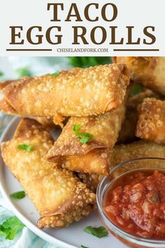 egg rolls on a plate with salsa and ketchup