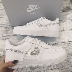 Authentic and Classic Nike Air Force One trainers beautifully hand embellished with genuine Swarvoski crystals on the Classic ticks. All the crystals are lovingly placed to ensure the maximum sparkle on this stunning style.  Available with two OR four ticks sparkled.