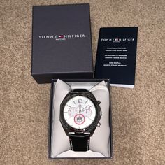 Tommy Hilfiger Men’s Watch Brand New In Box Black Genuine Leather Strap With White Stitching Protective Plastic On Front And Back Of Face 100% Stainless Steel Water Resistant Japan Movement, China Strap *Please Note, Watch Will Need New Battery. Leather Chronograph Watch With Analog Display As Gift, Black Watch With Tachymeter For Gift, Black Tachymeter Watch For Gift, Black Tachymeter Watch As Gift, Classic Black Watches For Father's Day, Black Tachymeter Watch Accessories As Gift, Leather Analog Watch As A Gift, Leather Analog Display Watch As Gift, Leather Chronograph Watch As Gift