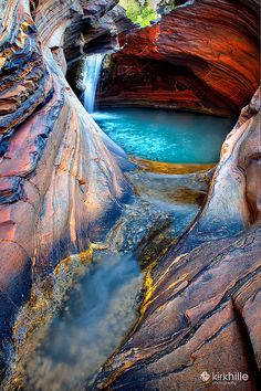 a river running through a canyon filled with water