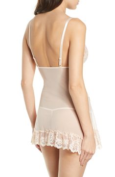 With an adjustable fit, an included G-string and perfectly placed lace and bow details, this babydoll chemise is the ideal invitation (or RSVP). Style Name:Oh La La Cheri Valentine Soft Cup Babydoll Chemise & G-String Thong. Style Number: 5758665. Wedding Night Camisole With Adjustable Straps, Feminine Camisole With Lace Trim And Underwire, Sheer Underwire Camisole, Coquette Wedding Night Camisole With Built-in Bra, Coquette Camisole With Built-in Bra For Wedding Night, Coquette Camisole For Wedding Night, Soft Cup, Lingerie Collection, Graduation Dress