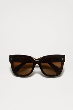 The 08 Sunglasses in Brown from CHIMI are handcrafted from premium Italian acetate with semi-flat lenses. Finished with silver-tone hardware rivets and the CHIMI logo engraved at the temples. Bold and timeless D-shaped frame. Sizing + Details → 100% Acetate 100% UVA+UVB Protection Square, Oversized Shape High Reduction Of Sun Glare Suitable For Sunny Conditions Anti-Scratch, Anti-Shatter, Distortion-Free Frame 152mm, Nose 24mm, Temple 145mm Classic Brown Acetate Cat Eye Sunglasses, Classic Brown Cat Eye Sunglasses In Acetate, Classic Brown Cat Eye Sunglasses With Square Frame, Free Frames, Coral Gables, Eyewear Womens, Fall Floral, Lifestyle Shop, Rivets