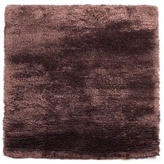 a brown rug with shaggy edges