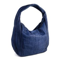 Handmade with genuine python leather, you can carry this soft, roomy hobo practically everywhere you go. Great for travel use! Being handcrafted and hand dyed, each piece will vary slightly in its color and pattern. Dimensions: Length 45cm; Height 51cm; Width 13cm; Sling drop 34cm (shoulder to zip) Material: Exterior - Hand dyed dark blue python leather - One way zip closure Interior - 1 zip pocket - 2 open compartment - Soft faux suede lining Care instructions: Like any leather material, avoid Blue Python, Python Bags, Origami Bag, Large Hobo Bag, Triangle Bag, Slouch Bags, Snake Skin Bag, Leather Hobo Bag, Hobo Handbags