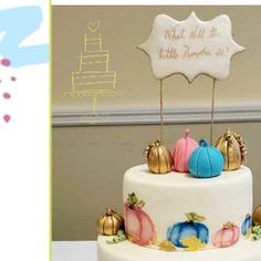 a three tiered white cake with colorful decorations on the top and bottom, along with a sign that says what hill is little pumpkin?