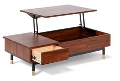 a coffee table with an open drawer underneath it