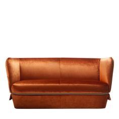 a brown leather couch sitting on top of a white floor