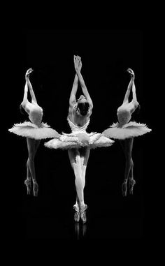 three ballerinas in black and white pose for the camera with their arms stretched out