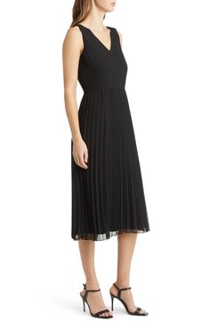 Designed in a sleeveless silhouette, this day-to-night dress is punctuated with a pleated chiffon skirt. 46" length (size 8) V-neck Sleeveless Lined 100% polyester Dry clean Imported Elegant Chiffon A-line Pleated Dress, Sleeveless Pleated Back Dress For Formal, Sleeveless Dresses With Pleated Back For Formal Events, Spring Formal Sleeveless Dress With Pleated Bodice, A-line Pleated Dress For Date Night, Spring Sleeveless Workwear Dress With Pleated Back, Sleeveless Chiffon Midi Dress For Evening, Spring Evening Sleeveless Dress With Pleated Waist, Spring Workwear Sleeveless Dress With Pleated Back