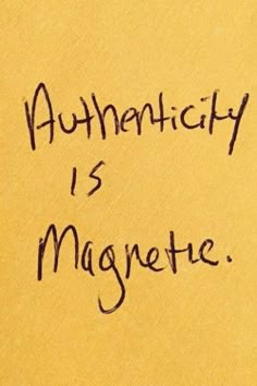 the words authenticity is magnetite written on a piece of yellow paper with black ink