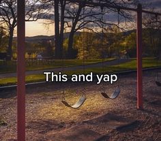 an empty swing set with the words this and yap in front of it that reads,