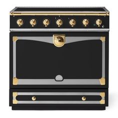 a black and gold stove top oven with two burners on each side, in front of a white background