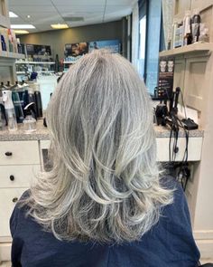 Long gray hair is a thing of beauty, and these inspirational photos prove that it's gorgeous at any age! In this post, I show off a variety of long gray hairstyles for women of all ages and teach you how to take care of your long grey hair as well. Don't let that old rule about no long hair after 40 get you down - rules are made to be broken! And if you think you're too young to wear gray hair? Think again - these beautiful ladies will show you how long silver hair works for everyone! Hair Ideas 50 Years Old, Layered Haircuts For Medium Long Hair, Layered Gray Hair Over 50, Long Haircuts For Women Over 50, Long Gray Hair Over 50, Grey Hair And Glasses