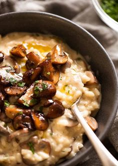 a bowl filled with mashed potatoes and mushrooms