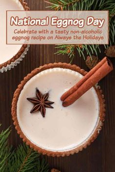 an eggnog drink with cinnamon sticks and star anise on the rim, surrounded by pine branches