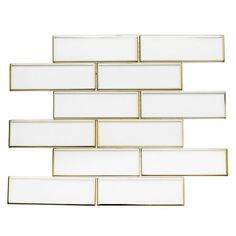 white glass tile with gold trims on the edges and bottom, against a white background