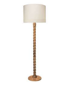 a wooden lamp with a white shade on it