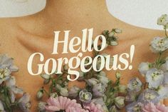 the back of a woman's shirt with flowers on it that says, hello gorgeous