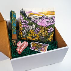 an open box with various items in it