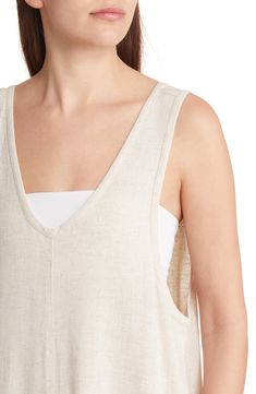 Keep it easy and breezy in this lightweight linen-kissed jumpsuit styled with handy pockets and cropped wide legs. 53" length; 21" inseam; 34" leg opening (size Medium) V-neck Sleeveless Unlined 80% rayon, 20% linen Machine wash, line dry Imported Beige Linen Summer Jumpsuits And Rompers, Beige Linen Casual Jumpsuits And Rompers, Sleeveless Linen Jumpsuits And Rompers For Day Out, Sleeveless Linen Jumpsuits For Day Out, Cream Jumpsuits And Rompers With Pockets For Summer, Chic Beige Linen Jumpsuits And Rompers, Sleeveless Relaxed Jumpsuits And Rompers For Spring, Relaxed Sleeveless Jumpsuits And Rompers For Spring, Casual Sleeveless Cream Jumpsuits And Rompers