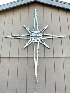 a large snowflake on the side of a building