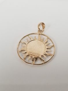 "Thanks for shopping our vintage estate store. We tend to sell well below wholesale and truly hope you enjoy all of our items. Many of the items are one of a kind, so please enjoy scrolling through the pictures and hopefully something will catch your eye. Brown spots are from the camera or reflections. Beautiful 14k yellow gold sun moon stars pendant. Length: 1 1/8\" with bail Width: 1\" Thickness: 1.2mm 1/16\" Weight: 2.10 grams Bail: 2.5mm Marked 14k, as all our gold is marked and tested to be Beach Rings, 14k Yellow Gold Necklace, Gold Hamsa, Sun Moon Stars, Gold Sun, Cz Diamond, Chain Choker, Star Pendant, Real Gold