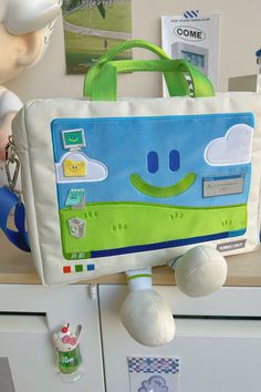 Windows XP Aesthetic Handbag - the cutest tech-inspired accessory ! This  bag features a smiling Windows XP character with adorable little legs

The bag's screen displays the iconic and cult-favorite Bliss wallpaper, taking you back to the days of serene green hills and clear blue skies 🌄☀️
On the bag's 'desktop,' you'll discover embroidered icons like the Recycle Bin, a folder, and even a Notepad application. Plus, there's a sweet dialog box that greets you with 'Hi baby, be happy, Ok? Sims 4 Cc Maxis Match Clothing Folder, Windows Xp Aesthetic, Cool Items To Buy, Items Aesthetic, Bliss Wallpaper, Cool Objects, Cool Stuff To Buy, Aesthetic Bag, Recycle Bin