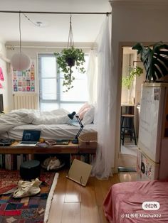 a living room filled with furniture and lots of clutter on top of the floor