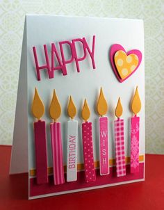 a happy birthday card with candles on it