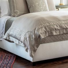 Our Vendome Taupe King Duvet will give your bedroom an effortlessly luxurious and opulent atmosphere with its classic style. The machine-washable ivory Silk & Sensibility fabric is made from a polyester blend that will remain soft with each at-home wash. Size: Generous 112x98 inches Fits all king sized beds Base Fabric: Silk & Sensibility (poly silk) Features Double Border Velvet Appliqué Finished with 3-inch flange Button closure for duvet insert Duvet insert not included, may be purchased sepa Custom Drapery Panels, Embellished Pillows, Luxury Duvet Covers, Custom Drapery, Duvet Cover Design, Bed Base, King Duvet, Queen Duvet, Queen Duvet Covers