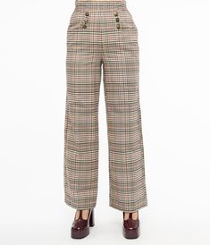 A classic pair of 1940s style sailor style slacks, the Ginger pants from Unique Vintage are a beige plaid complete in a striking 1940s vintage design. A thick waistband rests easily at the natural waist, secured by a side zipper and hook, while cute pockets on the sides and back add a charming retro accent. The wide pant leg creates a powerful retro silhouette to slim and flatter, while deep side pockets allow you to stowaway your keepsakes. Ginger's got pier perfection in check!Available in siz