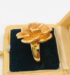 Fabulous huge sterling silver 18k gold vermeil rose ring. Large rose bud and petals...beautifully detailed. Nice shiny gold vermeil with minimal wear if any. Fully marked and acid tested as sterling silver. Flower measures 1 inch by 1 inch and is 3/8 inch in profile. Very 3 dimensional. Shoulders measure 5mm wide tapering to 3mm at back of band. Nice heavy quality ringweighs 11.2gms. Gorgeous Gold Rings With Rose Design In Fine Jewelry Style, Gold Rings With Rose Design Fine Jewelry, Gold Rings With Rose Design For Anniversary, Anniversary Gold Rings With Rose Design, Hallmarked 14k Rose Gold Flower Ring, Gold Flower Ring With Rose Design For Anniversary, Formal Yellow Gold Flower Ring With Rose Design, Formal Gold Ring With Rose Design, Vintage Rose Gold Flower Ring For Formal Occasions