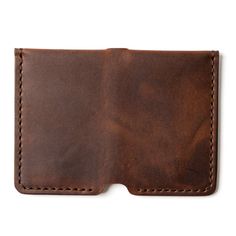 A durable bifold designed for front-pocket carry.The Vertical Wallet combines the classic bifold shape with a modern vertical style, making it perfect for front-pocket carry. Built to last a lifetime, the rustic full-grain leather not only endures the wear and tear of daily use but actually improves with age. Whether you're enjoying a night out at a craft brewery or tackling weekend projects, this wallet fits seamlessly into your lifestyle. Accidental drops, steps, or even being run over won't d Moleskine Cover, Full Grain Leather Wallet, Fisher Space Pen, Space Pen, Leather Mouse, Leather Mouse Pad, Oxblood Leather, Wallet Minimalist, Billfold Wallet