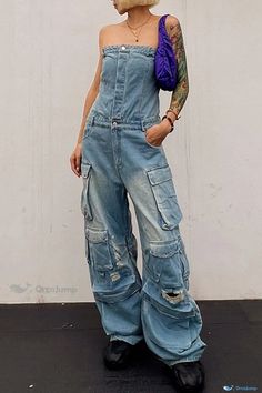 OrcaJump - Baby Blue Solid Denim Jumpsuit with Ripped Patchwork, Backless Design, Strapless Style, Sleeveless Cut, and High Waist Fit Blue Distressed Denim Overalls, Distressed Blue Overalls, Ripped Blue Overalls, Blue Ripped Overalls, Blue Distressed Denim Overall Jumpsuit, Blue Distressed Denim Jumpsuit, Sleeveless Blue Denim Overalls, Blue Sleeveless Denim Overalls, Casual Blue Ripped Jumpsuits And Rompers