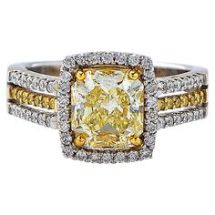 a fancy yellow and white diamond ring