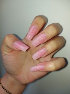 Pink Acrylic With Glitter, Shiny Pink Acrylic Nails, Light Pink Acrylics Coffin, Acrylic Pink Glitter Nails, Pink Sparkle Acrylics, Pink Sparkly Coffin Acrylic Nails, Pink Glossy Nails Acrylic, Nails Inspo Pink Glitter, Jelly Pink Nails Glitter