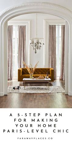 a living room filled with furniture and a chandelier