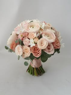 a bouquet of pink and white flowers on a white background