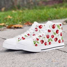 These stylish and comfy cherry sneakers are perfect for women and kids of all ages! Whether running errands, going to school, or hanging out with friends, these cactus sneakers will turn heads. They're also the perfect gift for any cherry lover! Features: * Full canvas double-sided print with rounded toe construction. * Lace-up closure for a snug fit. * Metal eyelets for a classic look. * Soft textile lining with lightweight construction for maximum comfort. * High-quality outsole for traction and exceptional durability.  Benefits: * Stylish and eye-catching design. * Comfortable to wear all day long. * Durable and made to last. * Perfect for any occasion. * Great gift for cactus lovers. Cherry Sneakers, Cactus Gift, Hi Top Sneakers, Cactus Gifts, Going To School, Sneakers For Women, Soft Textiles, Hi Top, Womens Tie