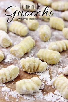 homemade gnocchini on a cutting board with powdered sugar