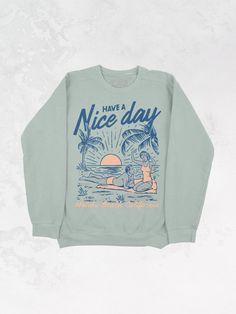 Get all of the summer-y vibes in this oversized Malibu Beach, California inspired sweatshirt!- Features the phrase "Have A Nice Day" across the top with a man and woman lying on a beach & "Malibu Beach, California" underneath it all in a navy and peach ink- Screen print transfer that is individually heat pressed onto each sweatshirt- Vintage washed sweatshirt that gets softer after every wash- Oversized fit- Sizing Translation: XS/S = M , S/M = L , L/XL = XL . 2XL/3XL = 2XL- 100% Cotton - Model is 5'9" wearing a size 2XL/3XL in the color Sage**due to screens & filters color may vary from pictures** Malibu Beach California, Navy And Peach, Washed Sweatshirt, 90s Sports, Malibu Beach, Screen Print Transfer, Malibu Beaches, Print Transfer, Western Chic