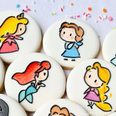 some decorated cookies with cartoon characters on them