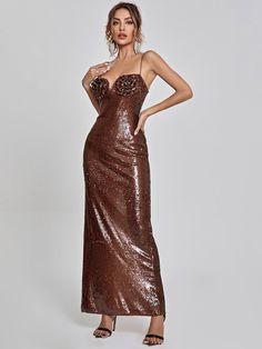 Feel like a million bucks in the Lorelei Brown Sequin Dress! This sequin occasion piece features a lovely maxi length, and a flirty split at the back. Perfect for those super special events coming up, pair this beauty with strappy heels, a clutch and statement jewellery to complete the look! Material: Sequin (100% Polyester) Invisible zipper opening at the back Stretch Factor: Slight Stretch Clean: Dry clean only Color may vary due to the lighting on images. The product images (without model) ar Brown Glitter Dresses Formal, Luxury Shimmer Sequin Dress, Luxury Brown Formal Dresses, Sequin Formal Dress Accessories, Cooper Sequins Prom Dress, Gold Dress With Heels Cognac, Luxury Fitted Shimmer Sequin Dress, Revolve Bronze Dress, Luxury Fitted Sequin Dress With Shimmer