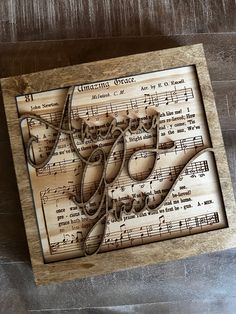 an art piece made out of sheet music