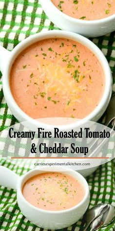 two bowls of creamy fire roasted tomato and cheddar soup on a green checkered cloth