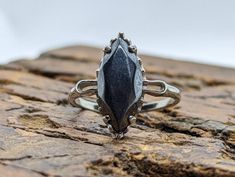 Rare Hematite  ring. 10k White Gold, Marked but has been tested. Beautiful claw setting around the hematite. 2.0grams total 7mm by 15mm marquise Hematite Size 5.25 Hematite Rings, Hematite Ring, Claw Setting, Cabochon Ring, Sarasota Fl, Sarasota, Gold Studs, Gold Earrings Studs, 10k Gold