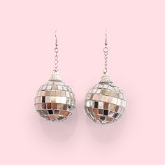 Get ready to boogie with these adorable disco ball earrings! The perfect blend of retro vibes and shimmer, they add a playful touch to any outfit. Whether you’re dancing or just want to shine brighter, these earrings are a must-have for any sparkle lover! Disco Ball Earrings, Retro Glam, Ball Earrings, Fragrance Gift, Disco Ball, Retro Vibe, Gift Accessories, Shine Bright, Free Gifts