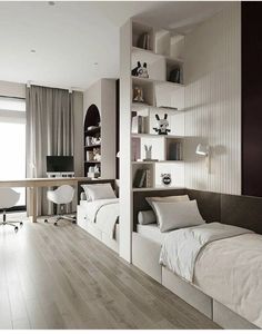 a bedroom with two beds, desk and bookshelves on the wall next to each other